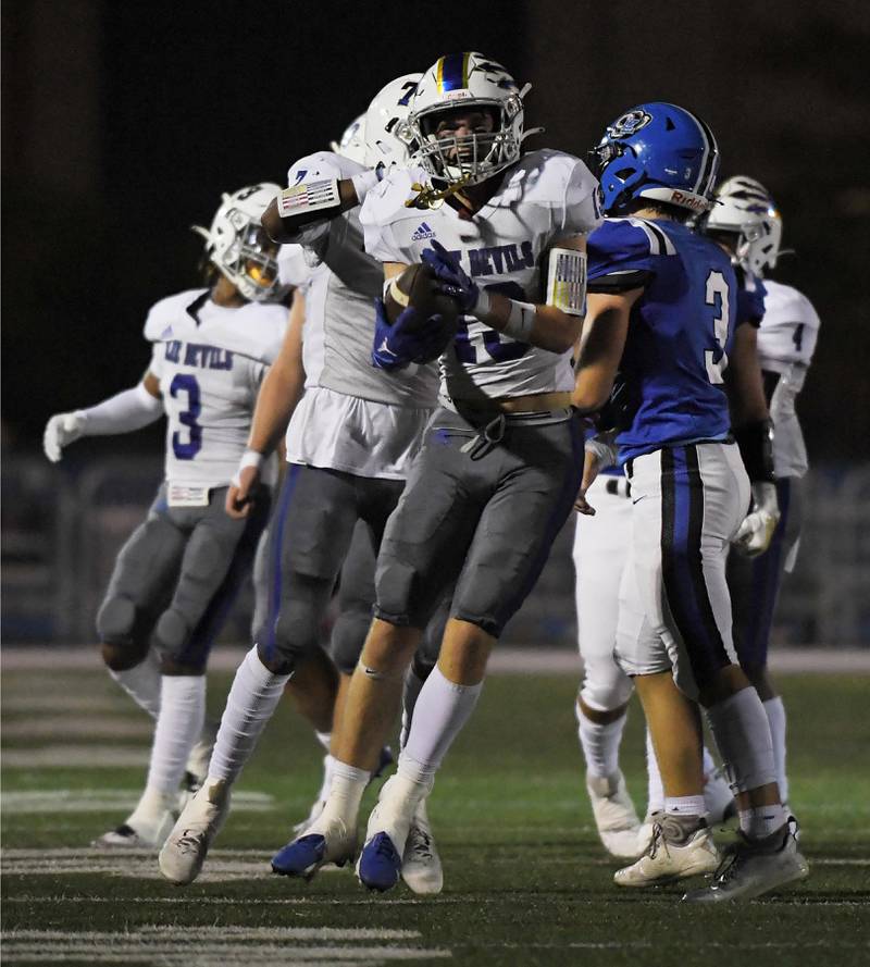 Warren’s Liam Wiley celebrates after making a first down catch against Lake Zurich in a football game in Lake Zurich on Friday, September 22, 2023.