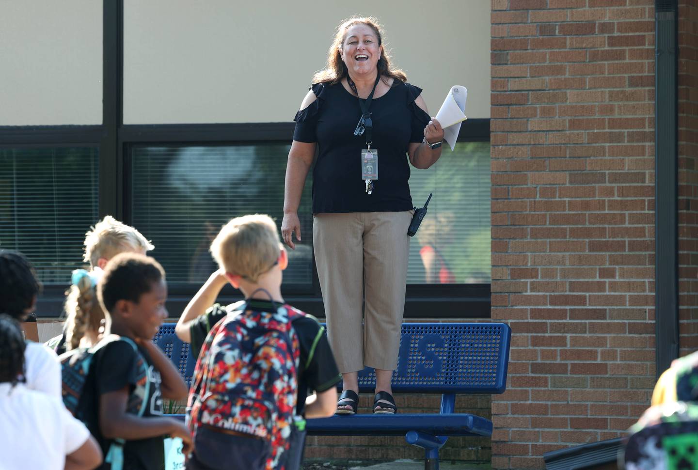 Lincoln Elementary School Principal Jennifer Tallitsch welcomes students for the first day of classes Wednesday, Aug. 14, 2024, at the school in DeKalb.