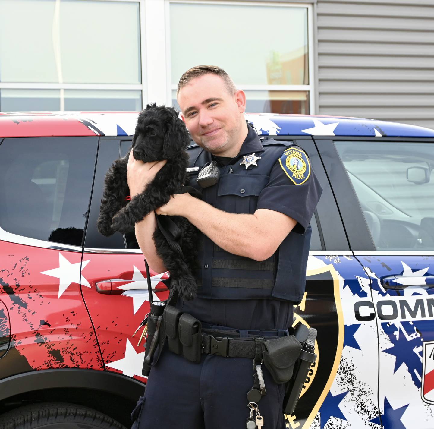 Community Initiative Officer Tyler Brewer with his partner K9 Rookie.