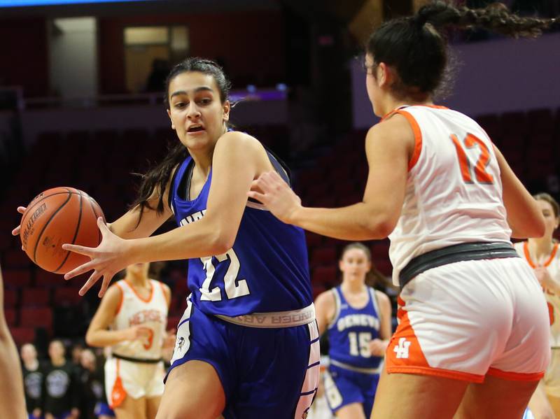 Geneva's Leah Palmer runs inside the lane as Hersey's Natalie Alesia defends during the Class 4A third place game on Friday, March 3, 2023 at CEFCU Arena in Normal.