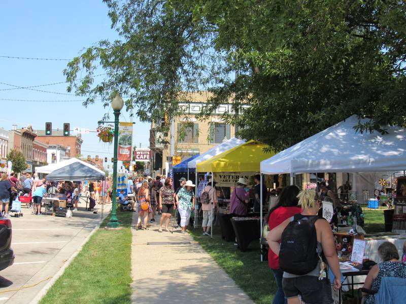 Patrons take in the work of local artists during the Liberty Arts Festival.