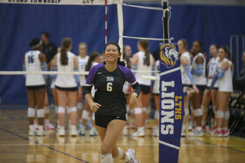 Downers Grove North's Nicole Liu (6) runs out during introductions before their Class 4A Lyons Sectional Semifinal volleyball match between Downers Grove South at Downers Grove North. Nov 4, 2025 in La Grange.