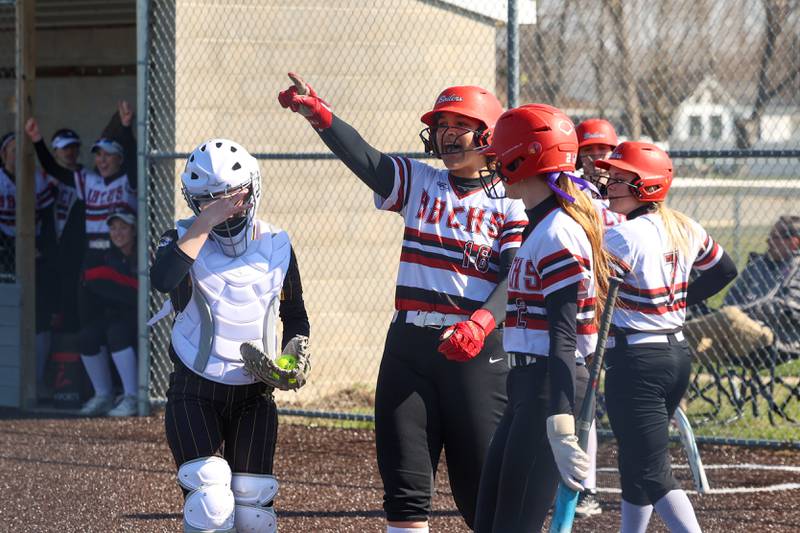 Bradley-Bourbonnais' Leila Middlebrook points to and praises a hit by teammate Abbie Hofbauer during their game against Herscher on Monday, March 23, 2026.