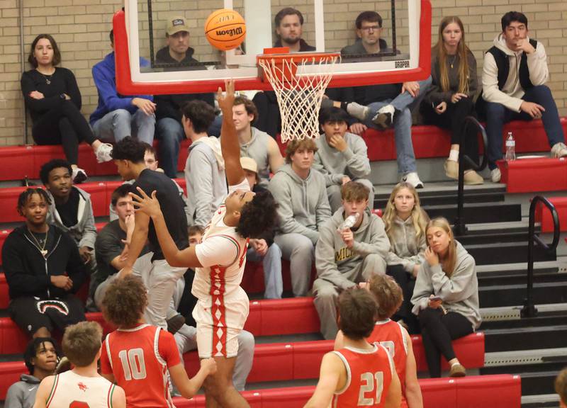 L-P's Marion Persich scores on a layup against Streator during the Dean Riley Shootin' The Rock Thanksgiving Tournament on Monday Nov. 24, 2025 in Kingman Gymnasium at Ottawa High School.