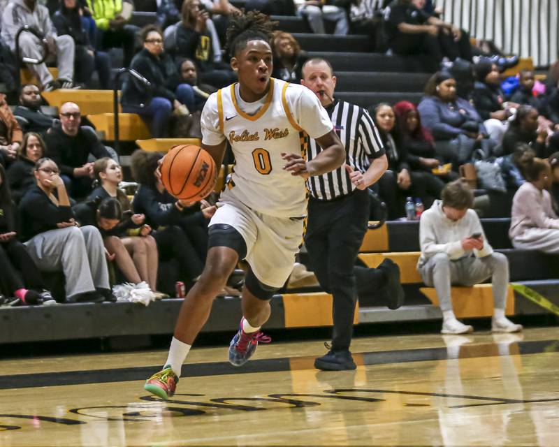 Joliet West's Aamir Shannon (0) takes off to the basket during their basketball game between Plainfield South at Joliet West, Feb 2, 2026 in Joliet.