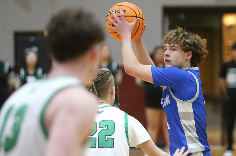 Princeton's Jayden Fulkerson looks to pass the ball around Rock Falls's Nehemiah Menendez during the Class 2A Sectional final on Friday, March 7, 2025 at Marengo High School.