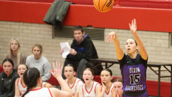 Dixon rattles off 33-1 run, bests Ottawa by 18 at Kingman Gym