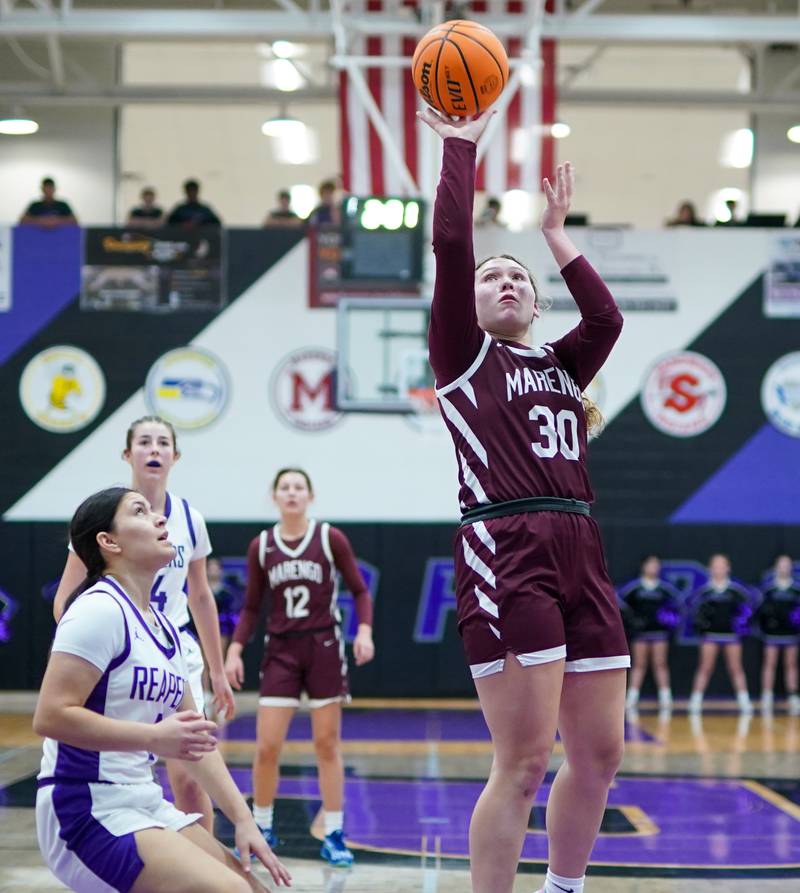 Marengo’s Macy Noe (30) shoots the ball in the post against Plano during a basketball game at Plano High School on Wednesday, January 29, 2025.