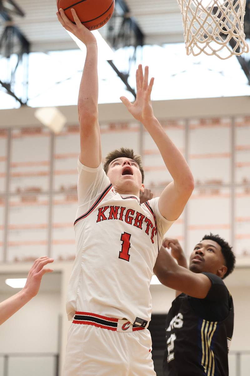 Lincoln-Way Central’s Ethan Vrabec puts up a shot against Lemont in the Lincoln-Way West Warrior Showdown on Saturday January 28th, 2023.
