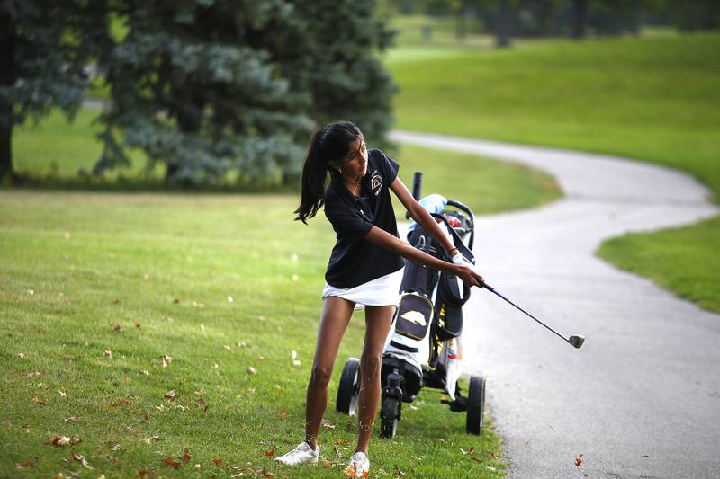 Metea Valley’s Maya Shah hits onto the fairway during the Class 2A Waubonsie Valley Girls Golf Sectional on Monday, Oct. 6, 2025 at Springbrook Golf Course in Naperville.
