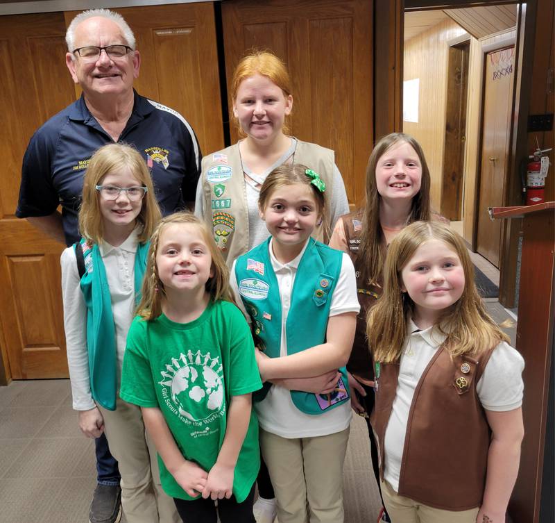 Marseilles Mayor Jim Hollenbeck (left) pauses in appreciation of an invitation from the Marseilles Girl Scout Troop 1667 to attend their “Walking Taco Tuesday” event, slated for 5-7 p.m. on Nov. 19 at the Marseilles Public Library. The scouts are (from left) Lilith McLain, Leila Johnson, Caitlyn Trettenero, Alexa Johnson, Arianna Mundt and Ryleigh Johnston.
