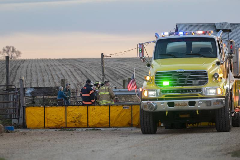 Firefighters work at 8455 Judson Road in rural Polo Monday, Nov. 17, 2025, attending to a shed fire. Departments from Mount Morris, Polo, Dixon and Sterling were seen working at the site.