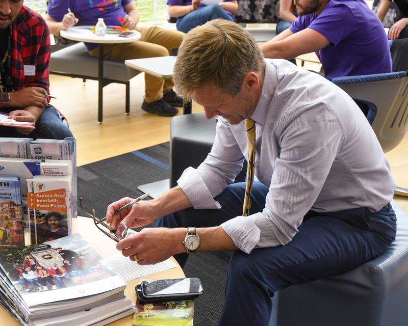Waubonsee Community College president Dr. Brian Knetl participates in activities during the pride party held on the Plano campus on Thursday June 29, 2023.