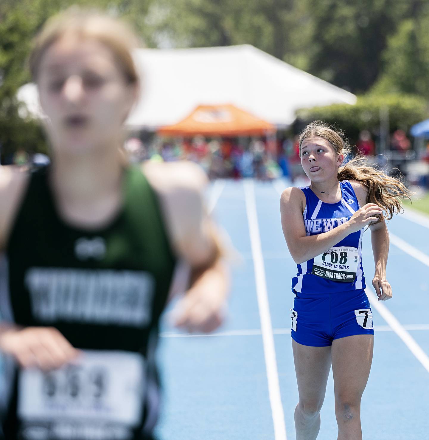 Newman’s Elaina Allen finishes the Class 1A 100 dash as a freshman at the IHSA girls state track meet in Charleston.