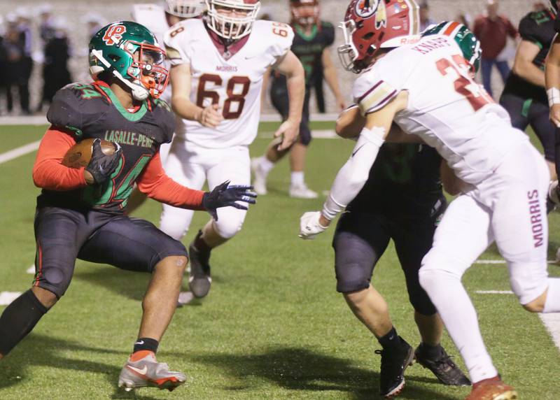L-P's Tre'von Hunter (no,34) runs the ball against Morris's on Friday Oct. 15, 2021.