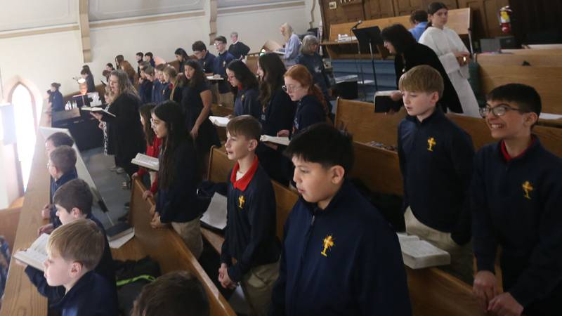 Students from Academy of St. Carlo Acutis, sing in the choir during the very first all-school Mass on Friday, Jan. 30, 2026 at St. Joseph’s Catholic Church in Peru.