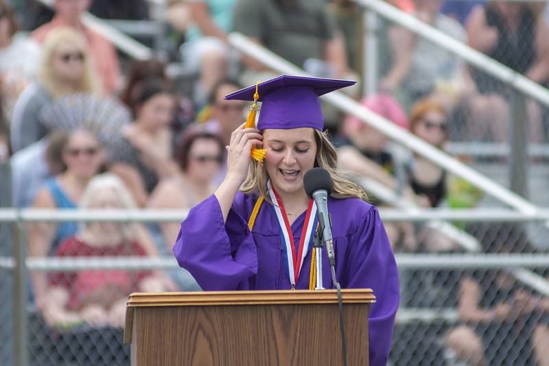 Class of 2022 salutatorian Eleanor Zimmerman reads her speech Sunday, May 29, 2022 during Dixon High School’s graduation.
