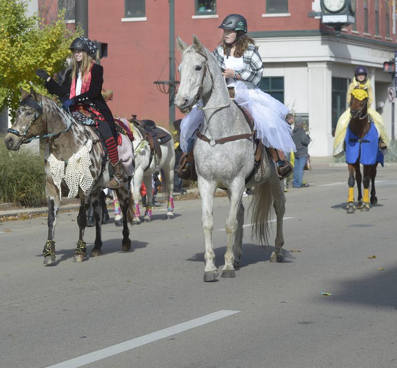 ostumed horses and their riders participated in Ottawa’s Halloween Parade Saturday marching down La Salle St.