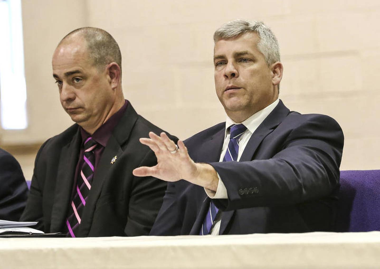 Mayor Bob O'Dekirk gestures to Herald-News reporter Felix Sarver after denying him to ask a question Thursday, May 16, 2019, during a public forum on the police shooting of Bruce Cater in Joliet, Ill. "You're here to sell papers," O'Dekirk said after cutting off Sarver. “We’re not here to talk to the media, we’re talking to people of Joliet."