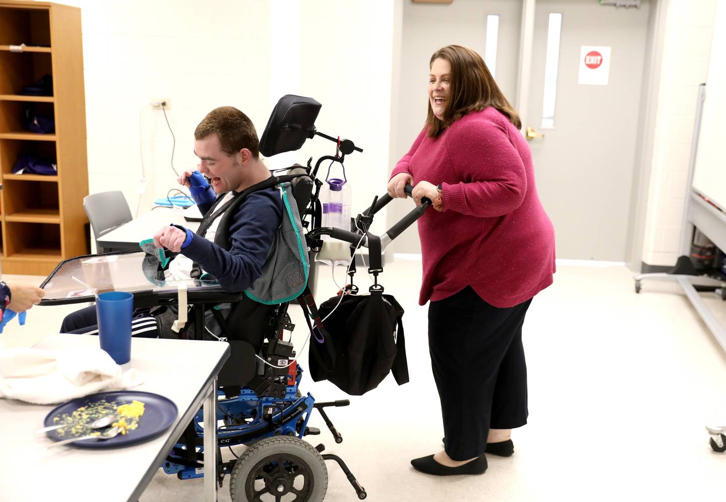 Anne Dragosh works with Tommy Loehrke at the Haines Center in St. Charles. Dragosh is the St. Charles District 303 Transition Program coordinator.