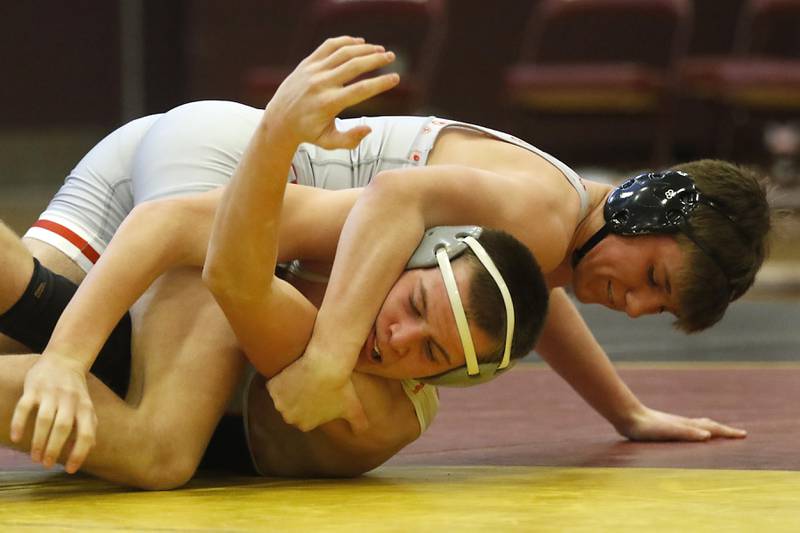 Marian Central’s Ethan Struck controls Genoa-Kingston’s Brady Brewick in their 152-pound championship wrestling match in the IHSA 1A Richmond-Burton Wrestling Regional Thursday, Jan. 19, 2023, at Richmond-Burton High School in Richmond.