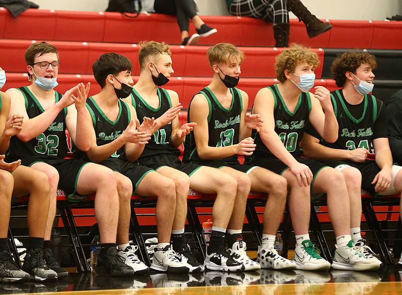 Members of the Rock Falls boys basketball team watch their team score a basket against Bureau Valley during the 74th annual Colmone Classic tournament on Wednesday Dec. 8, 2021 at Hall High School in Spring Valley.