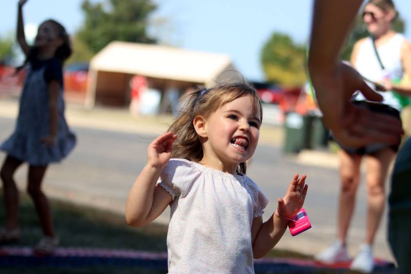 Sofia Prokopenko, 2, of Huntley dances with other children as the Mr. Myers band plays a theme from Disney’s “The Little Mermaid” movie during the 20th Annual Fall Fest at Deicke Park in Huntley on Sunday, September 28, 2025.