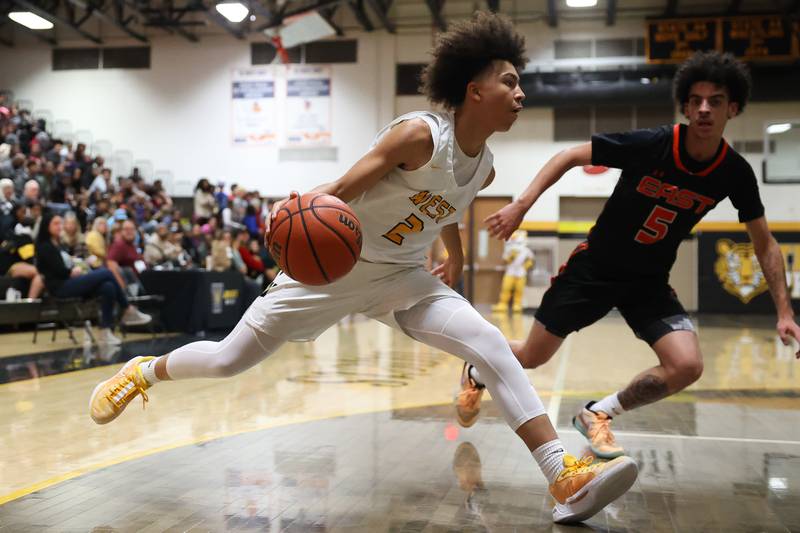Joliet West’s Corey Nobles drives along the baseline against Plainfield East on Friday, Dec. 8th, 2023 in Joliet.