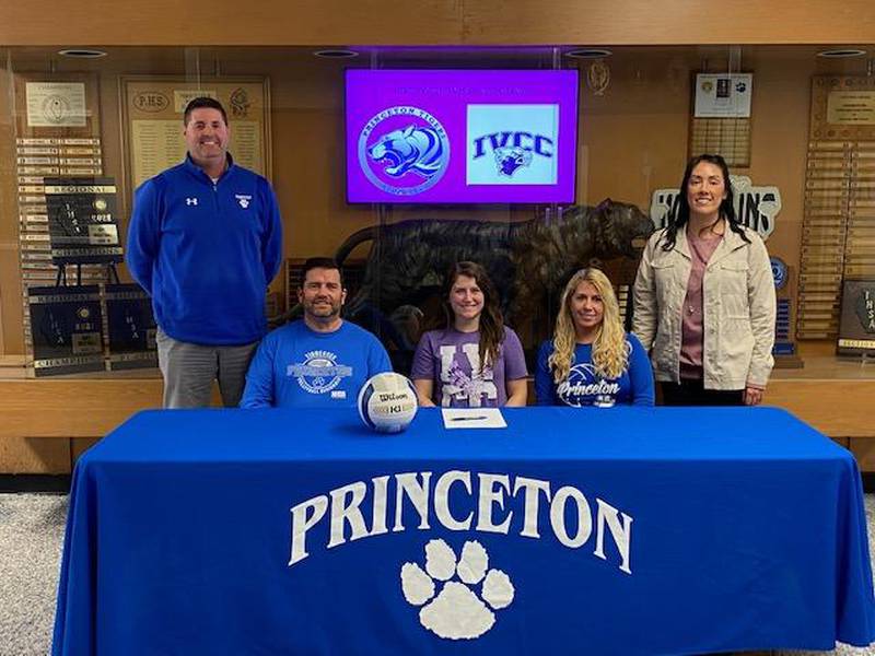 Princeton senior Taylor Wetsel (center) recently signed to play volleyball for IVCC. She was joined at her signing by her parents, Gary and Nicole; and (standing) PHS coaches Andy and Gina Puck.