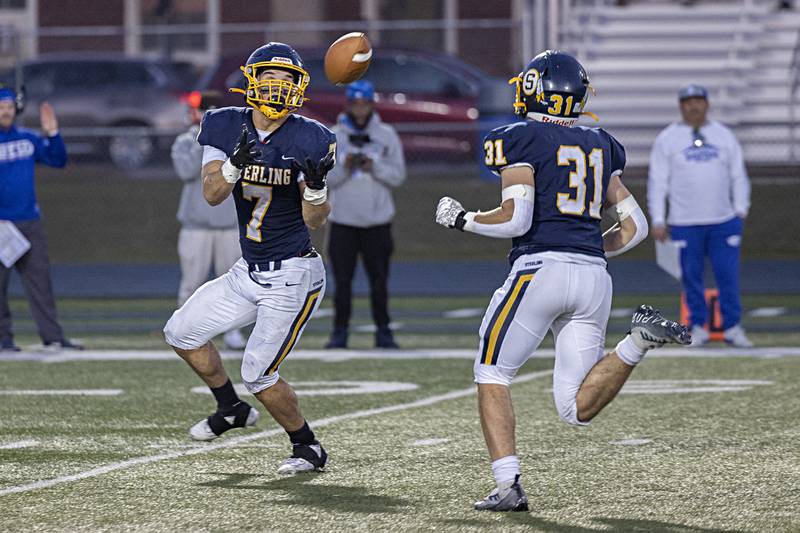 Sterling’s Andre Klaver makes an open field catch and runs it in for a TD against St. Francis Saturday, Nov. 4, 2023 in a class 5A playoff game in Sterling.