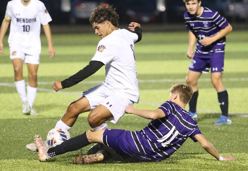 Mendota's Ramiro Palacios avoids a slide tackle from Peoria Christian's Myles Zimmerman during the Class 1A Sectional game on Wednesday, Oct. 30, 2024 at Chillicothe High School.