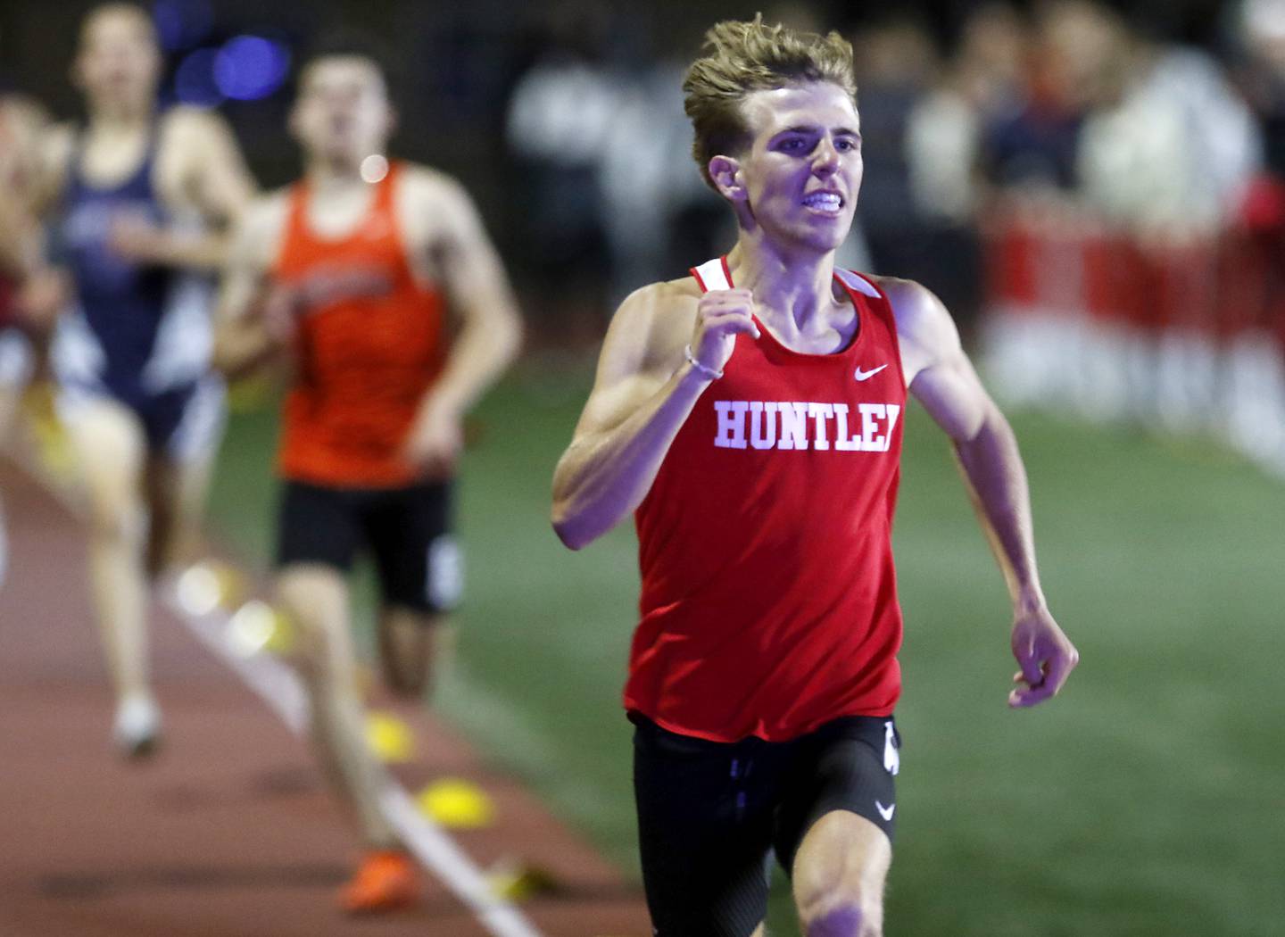 Huntley’s Tommy Nitz races to the finish line to win the 1600 meter run during the Huntley IHSA Class 3A Boys Sectional Track and Field Meet on Thursday, May 22, 2025, at Huntley High School.