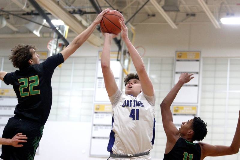 Lake Zurich’s Anton Strelnikov takes a shot against Crystal Lake South in Hinkle Holiday Classic boys basketball tournament game action at Jacobs High School Wednesday.