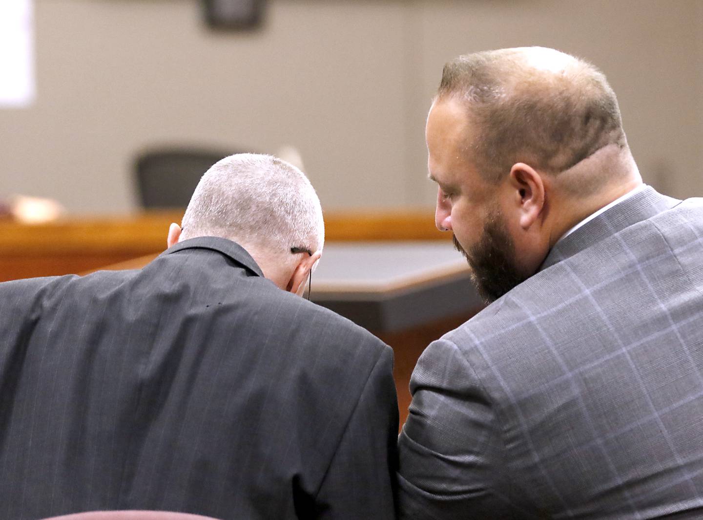 Robert J. Gould, 56, talks with his attorney Dominic Buttitta Jr. on Monday, Nov. 14, 2022, during his trial before Judge Michael Coppedge. Gould, who was on McHenry County’s most wanted list when arrested in 2017, is accused of repeatedly sexually abusing two children throughout their childhoods beginning in 2001.