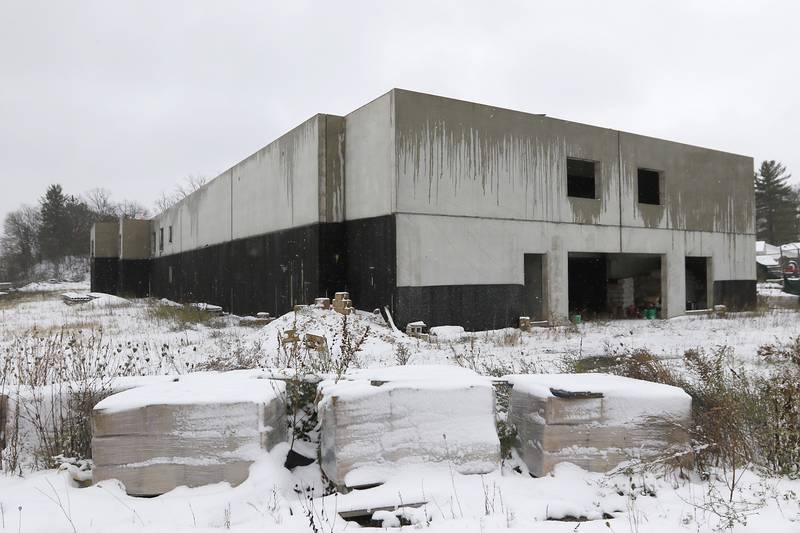 The Grove Residences on Thursday, Nov. 21, 2024, in Fox River Grove. The Village of Fox River Grove plans to put up a new fence around abandoned unfinished apartment complex over safety and resident concerns after the old fence was removed.