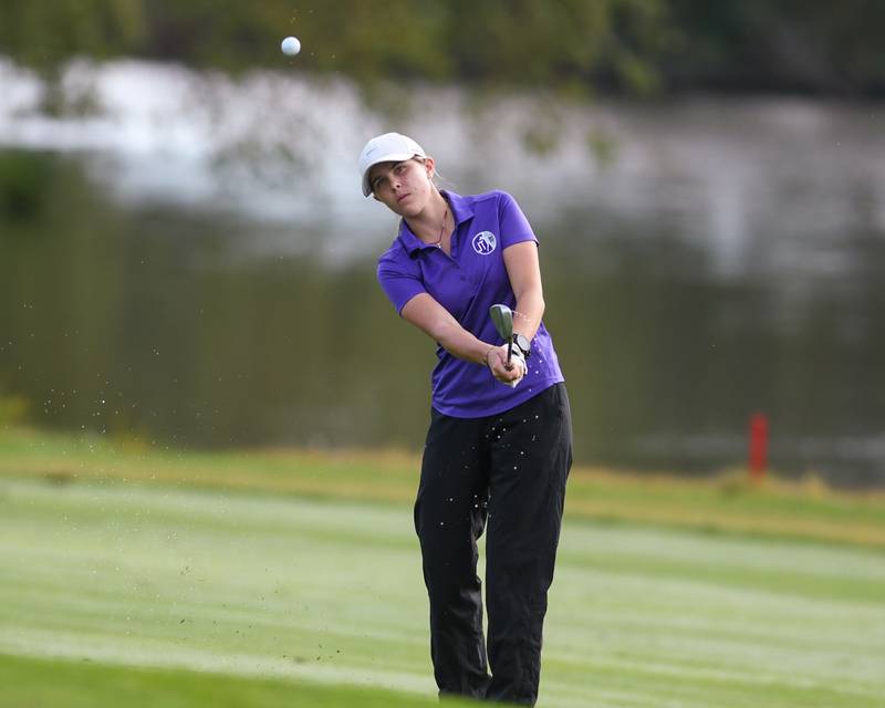 Sophia Podmolik of Joliet Township chips during the Southwest Prairie conference meet on Wednesday Sept. 24, 2025, held at Blackberry Oaks Golf course in Bristal.