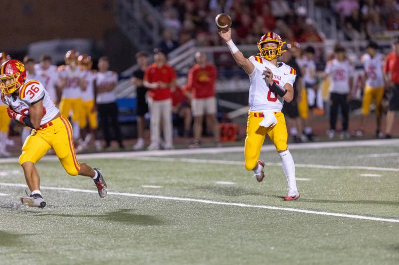 Batavia's Michael Vander Luitgaren  throws a pass against St. Charles North on Friday, Sept. 26, 2025 in St. Charles.
