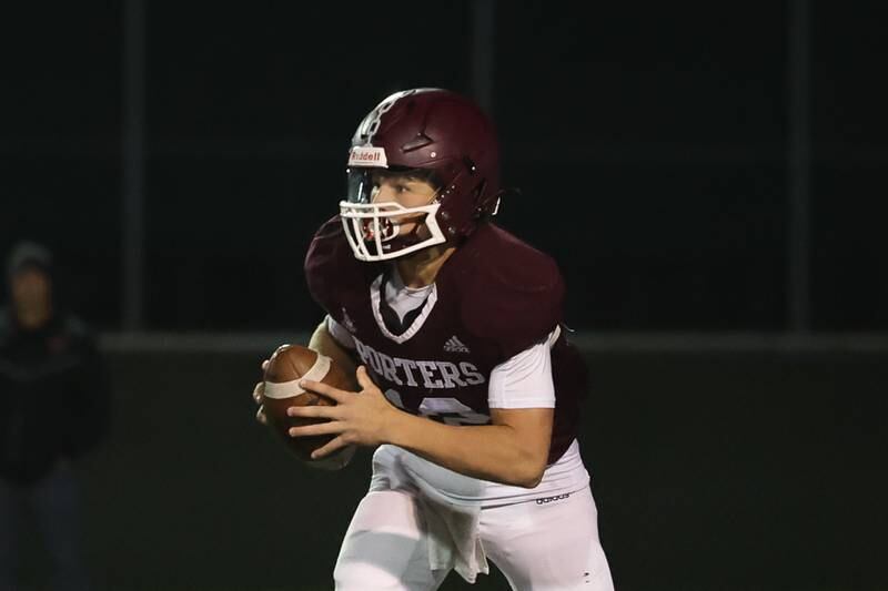 Lockport’s Brendan Mecher looks for a play against Lincoln-Way West on Friday, Oct. 18, 2024 in Lockport.