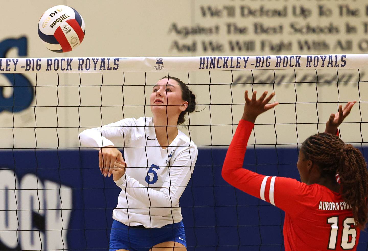 Hinckley-Big Rock’s ILY Hunt spikes the ball during their match against Aurora Christian Tuesday night at the school in Hinckley.