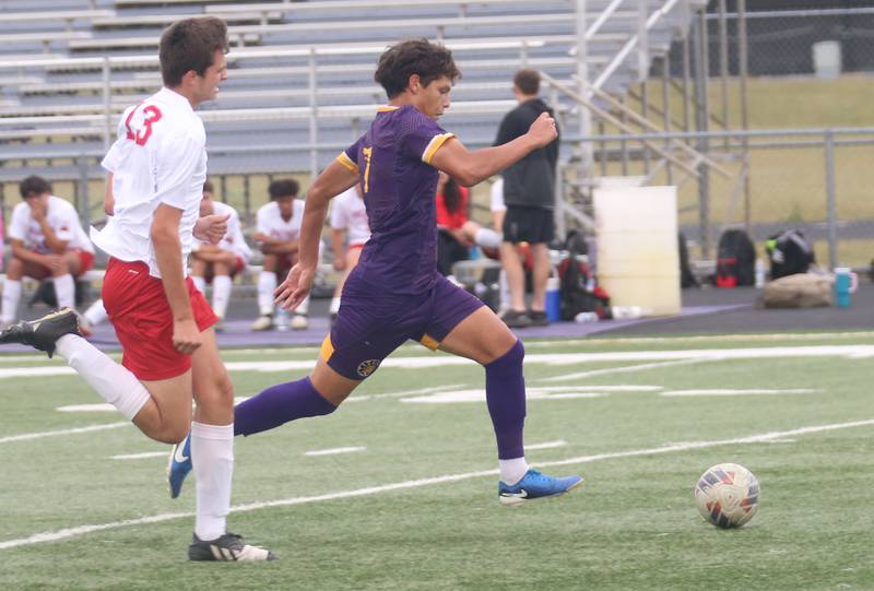 Mendota's Isaac Diaz sprints past Streator's Aaron Henson to set up a goal kick on Monday, Sept. 23, 2024 at Mendota High School.