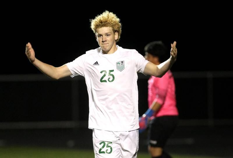 York’s Kevin O’Connor celebrates his penalty kick point in of the 3A Boys Soccer Supersectional against Elgin at Streamwood High School on Tuesday, Nov. 1, 2022.