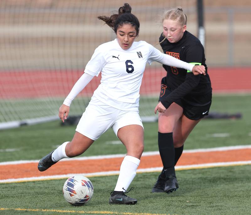 DeKalb’s Ashley Diedrich plays defense against Belvidere North’s Keyla Suarez during their game Wednesday, March 15, 2023, at DeKalb High School.