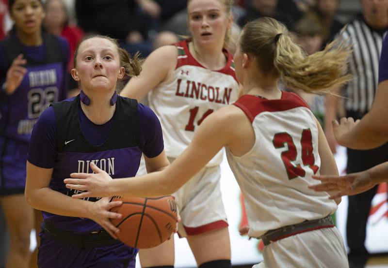 Dixon’s Katie Drew looks to drive to the hoop against Lincoln in the class 3A super sectional Monday, Feb. 26, 2024 at LaSalle-Peru High School.