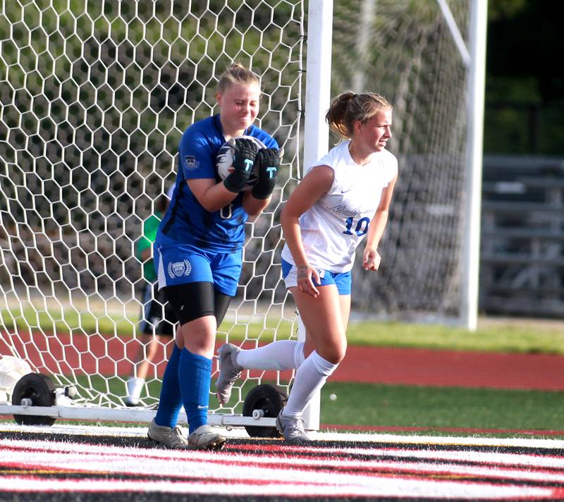St. Charles North goal keeper Lauren Korioth makes a save during the Class 3A state semifinal game against Fremd at North Central College in Naperville on Friday, May 31, 2024.