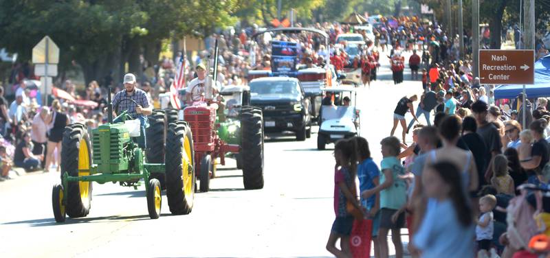 Streets along the  Harvest Time Parade route were filled with spectators on this portion of S. Fourth Street (state Route 2) during the Autumn on Parade festival in Oregon on Sunday, Oct. 5, 2025.