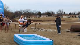 McHenry High raises almost $5K for Special Olympics in school’s first polar plunge