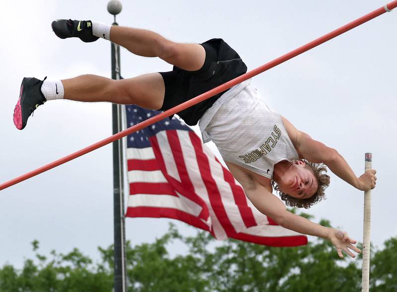 Sycamore’s Braedon Shaner clears the bar in the pole vault Thursday, May 16, 2024, during the Class 2A boys track sectional at Sycamore High School.