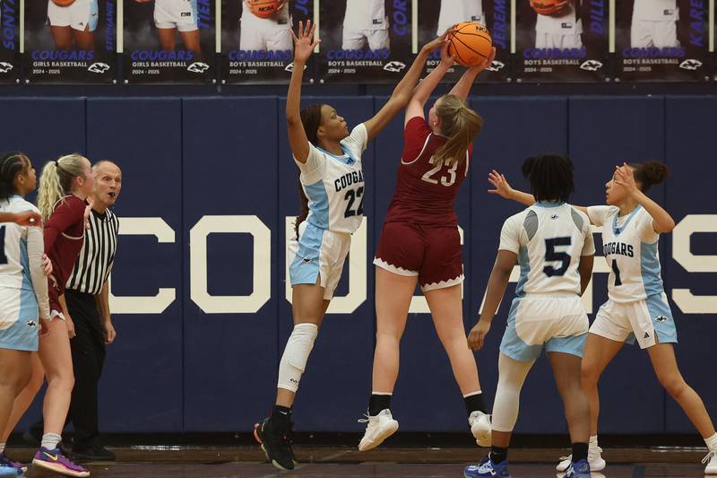 Plainfield South’s Fathia Olagunju goes for the block against Plainfield North on Thursday, Jan 9, 2025.