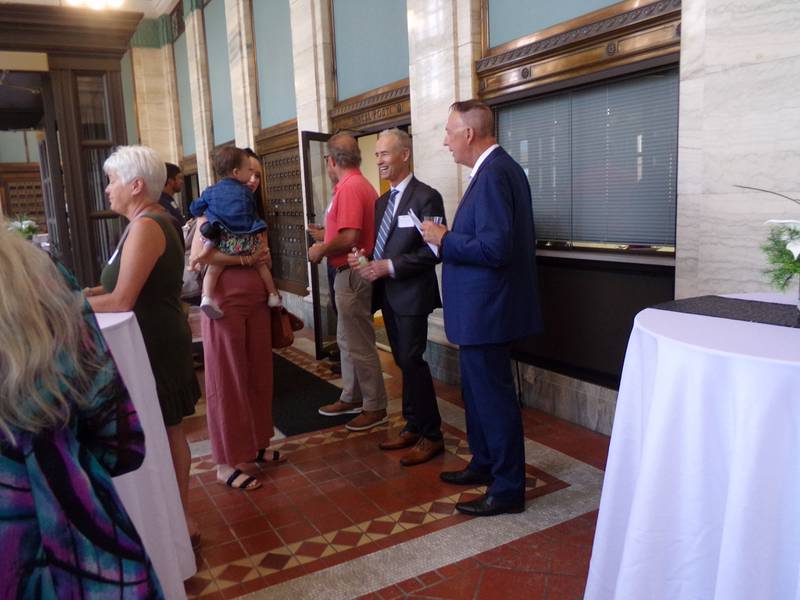 Fran Brolley (center), new director of Starved Rock Country Community Foundation, mingles with supporters, family and friends Thursday, June 1, 2023, at a foundation event in La Salle.