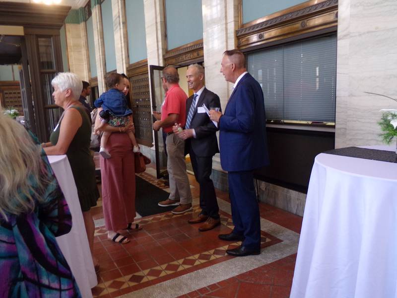 Fran Brolley (center), new director of Starved Rock Country Community Foundation, mingles with supporters, family and friends Thursday, June 1, 2023, at a foundation event in La Salle.